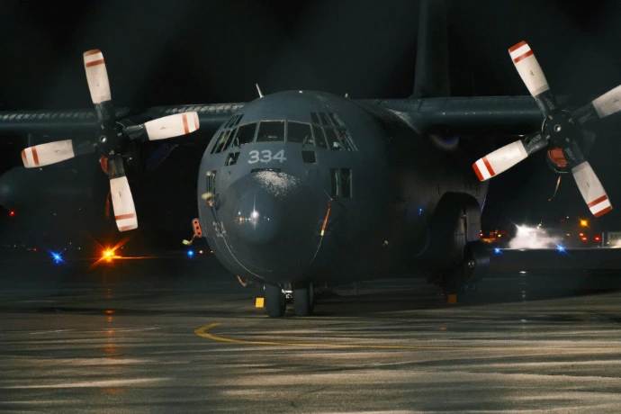 A military transport plane is ready for takeoff.